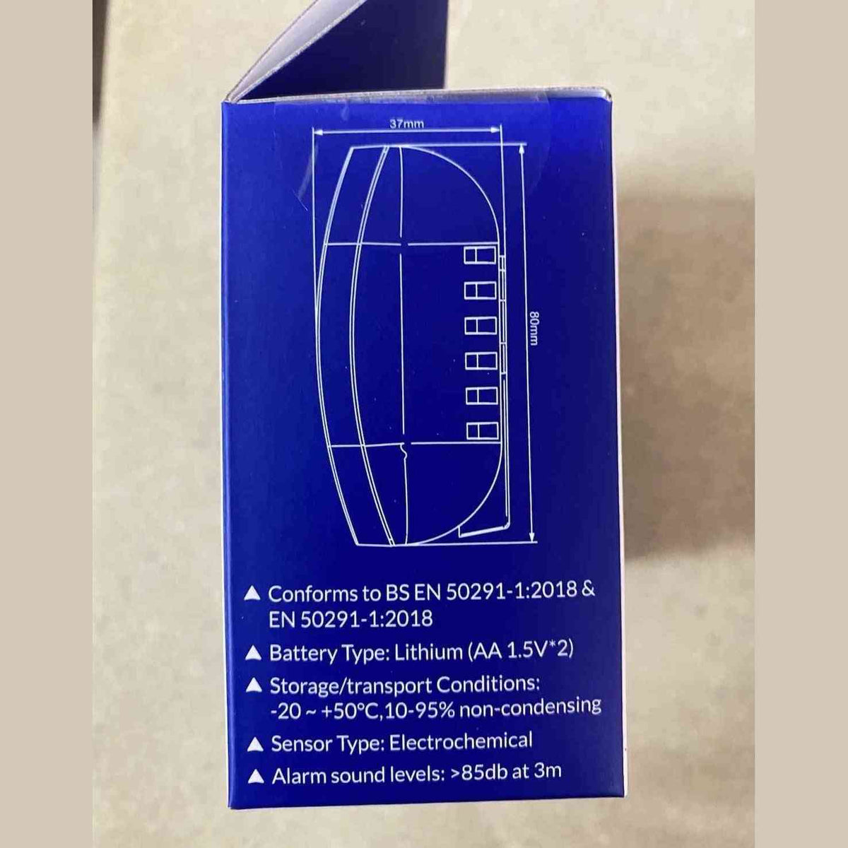 Deta 1139 CO detector side panel displaying BS EN 50291 certification and dimensions
