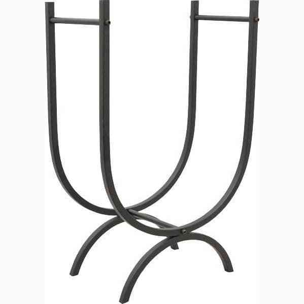 Minimalist black metal fireplace log holder with curved frame, designed for storing firewood near a modern fireplace