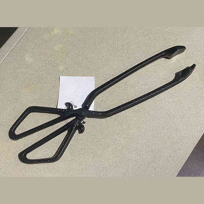 Black cast iron coal tongs with scissor-action pivot and loop handles