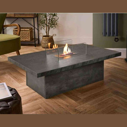 Modern slate effect bio ethanol fire pit table in living room setting