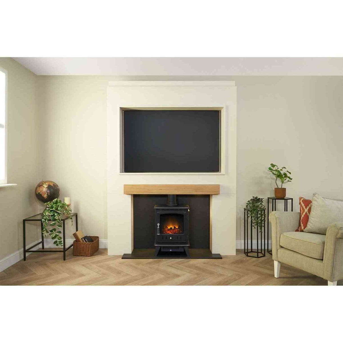 Living room setup featuring Acantha pre-built stove media wall with oak mantel