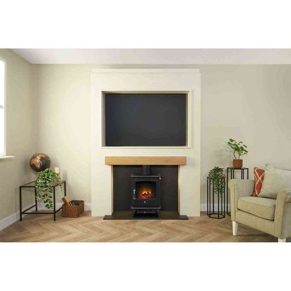 Living room setup featuring Acantha pre-built stove media wall with oak mantel