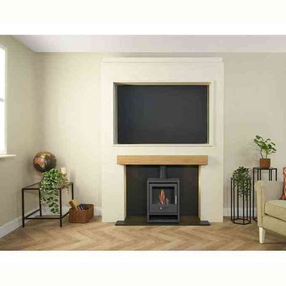 Off-white Acantha Media Wall 2 living room setup with oak mantel, TV recess, and bio ethanol fire