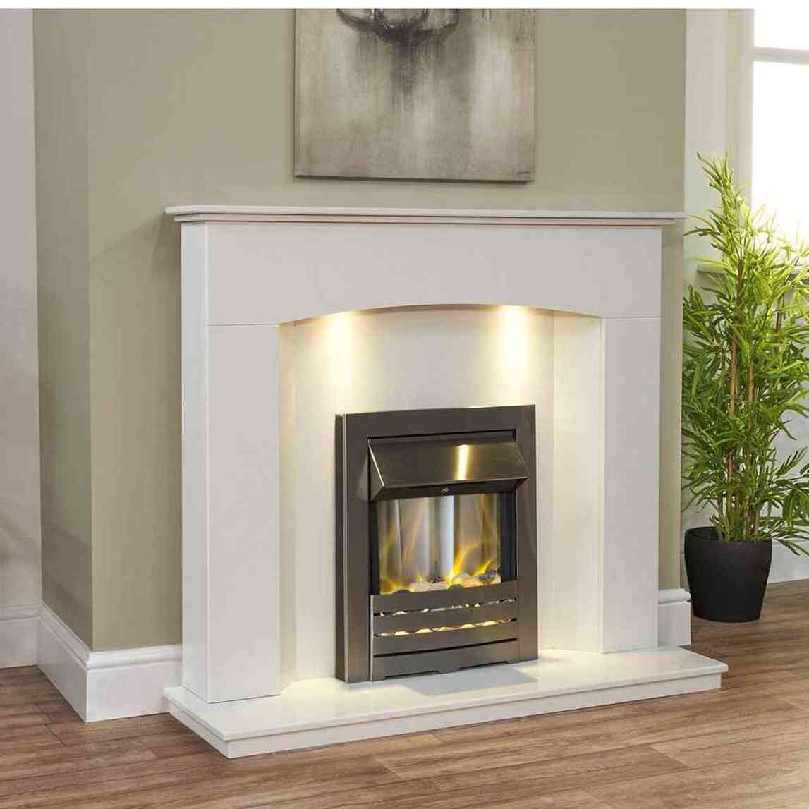 Adam Helios brushed steel electric inset fire in arched white mantel with bamboo plant