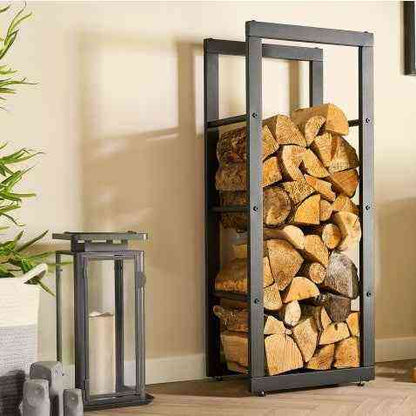 Industrial black metal firewood log holder with ample storage for chopped logs, positioned indoors near a fireplace, SKU: 26857