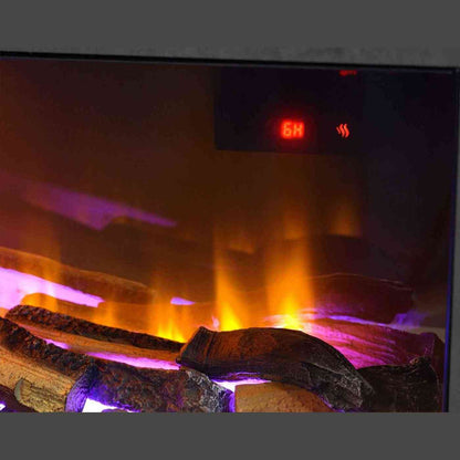 Interior close-up of Aurora Aries electric fire showing glowing logs on reflective crystals with digital timer display and ambient lighting