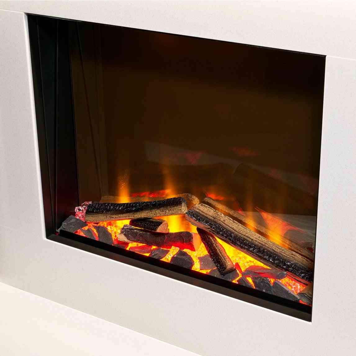 Extreme close-up of dark logs and glowing embers with flickering LED flames inside Aurora Inferno 500 SQ firebox