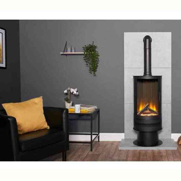 Black cylinder electric stove installed on stone hearth in modern living room with glowing LED flames