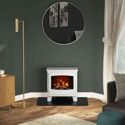 Cozy living room scene featuring white freestanding electric stove with fire effect