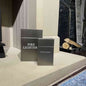 Two-piece brushed silver metal fireplace storage solution with hinged lids