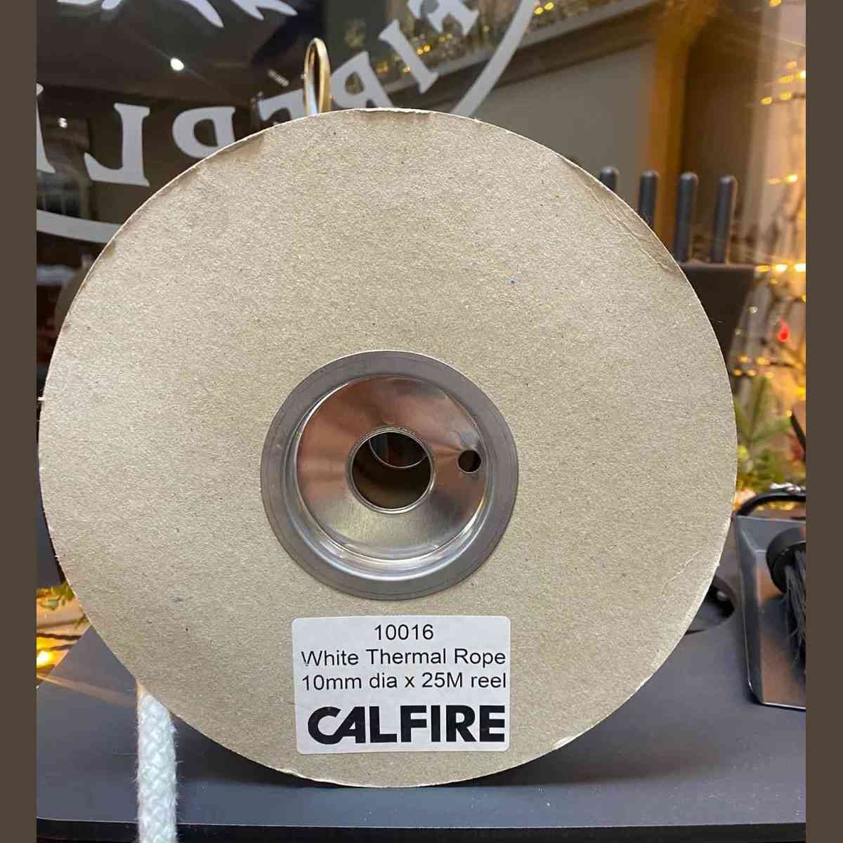 Calfire 10mm white thermal stove rope seal on cardboard reel with label