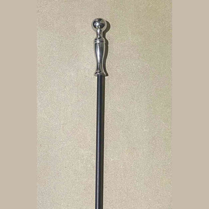 Close-up of polished chrome spherical knob and flared handle on Calfire fireplace tool