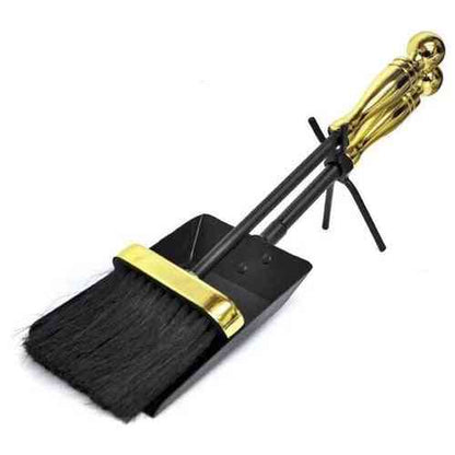 Black cast iron stove cleaning tools with gold handles and brass accents on white background