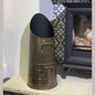 Calfire Dryton antique pewter coal scuttle on stone hearth with wood stove
