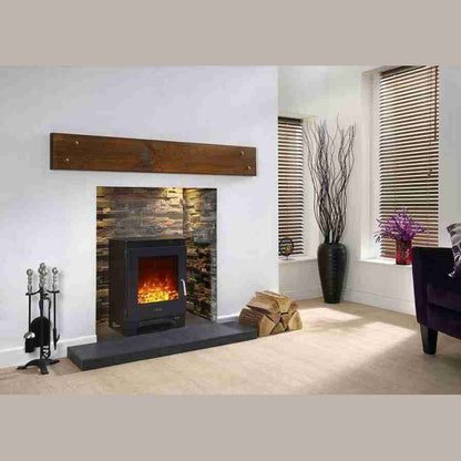 Celsi Electriflame XD Metal 1 freestanding electric stove in black with LED flame effect in stone fireplace setting