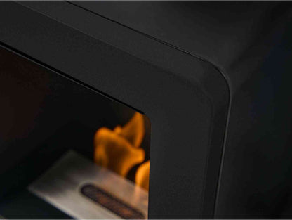 Detailed view of the black bio ethanol stove's corner, highlighting its smooth matte finish and flame display
