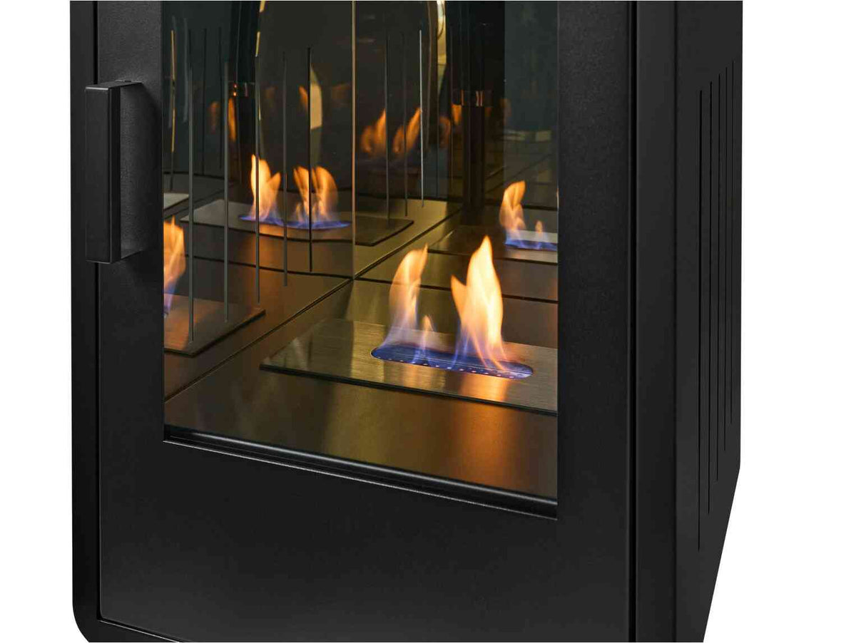 Close-up of black bio ethanol stove with glass door and visible flames, highlighting the sleek modern design and flame effect