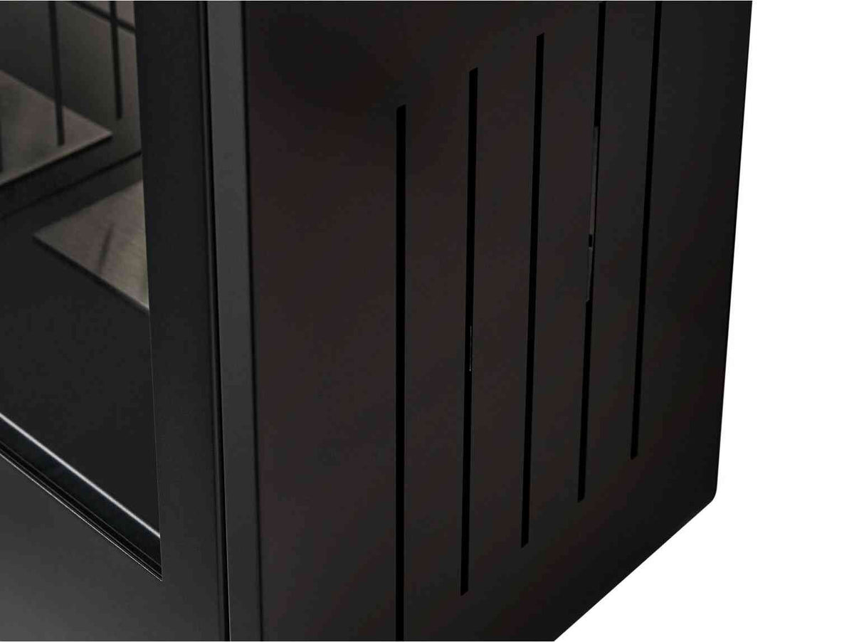 Close-up of black stove's side panel with vertical slats, emphasizing sleek modern look and textured finish