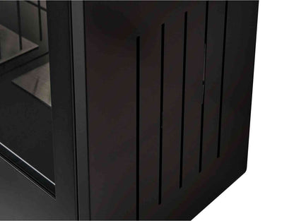Close-up of black stove's side panel with vertical slats, emphasizing sleek modern look and textured finish