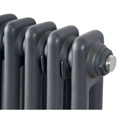 Anthracite electric column radiator detail with chrome valve cap and mounting clips