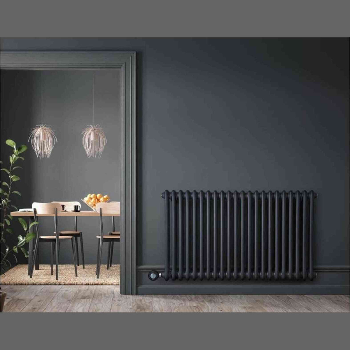 Eden Arcadia anthracite radiator installed in modern living room near console table