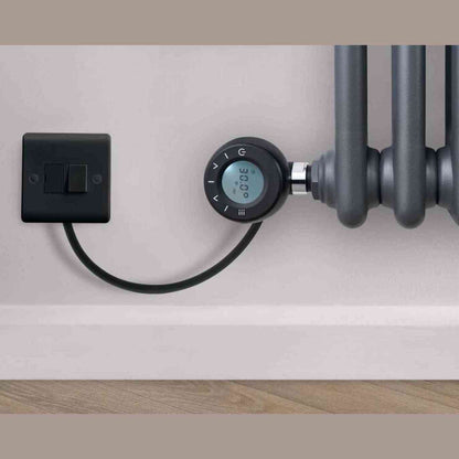 Eden Arcadia smart WiFi radiator installed with dual-toggle switch and thermostat display