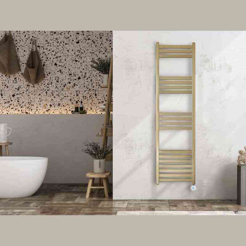 Full-wall view of tall brushed brass Eden electric towel radiator in modern bathroom setting