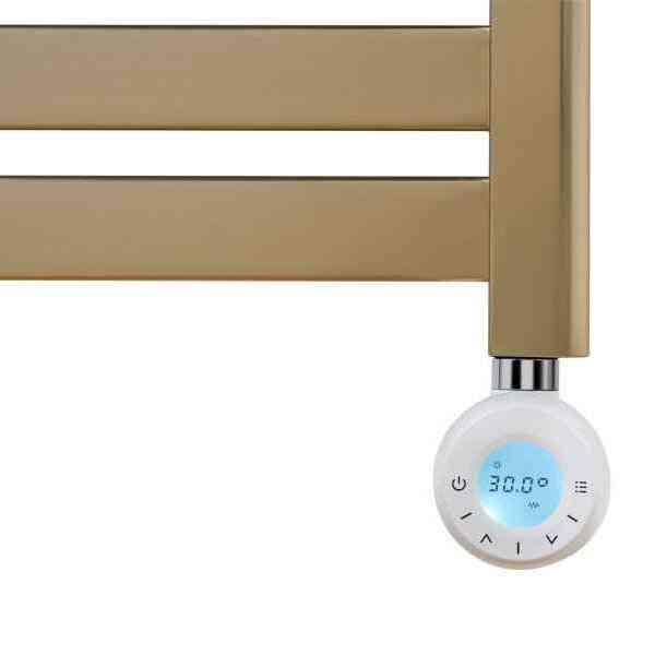 Blue backlit digital thermostat display showing temperature control on Eden electric towel radiator