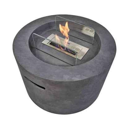Top-down view of lit Field & Flame bioethanol fire pit with active flames, glass wind guards, and control indicators