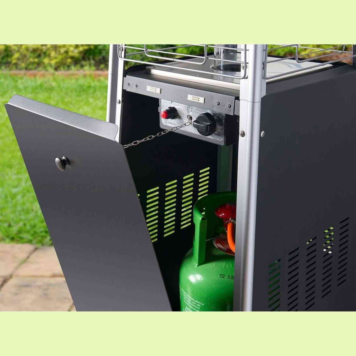 Side view showing green propane tank inside black Field & Flame outdoor gas heater base