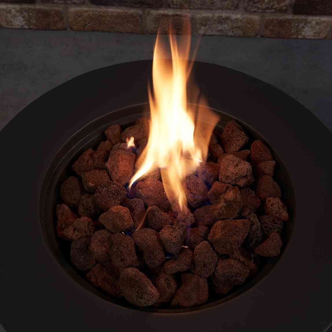 Marilla charcoal grey gas fire pit interior with lava rocks and active flame