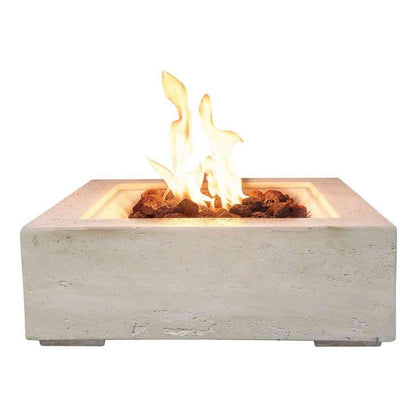 Square beige travertine-effect gas fire pit with lava rocks and flame