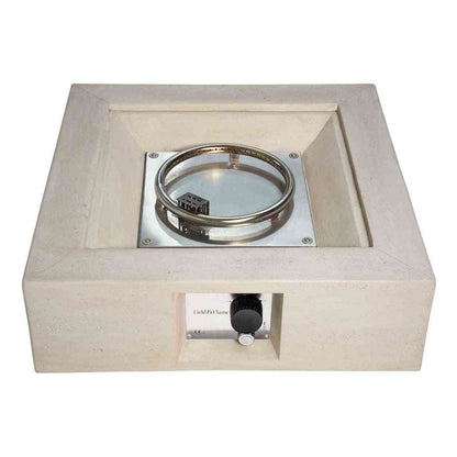 Top-down view of stainless steel burner and control panel on gas fire pit