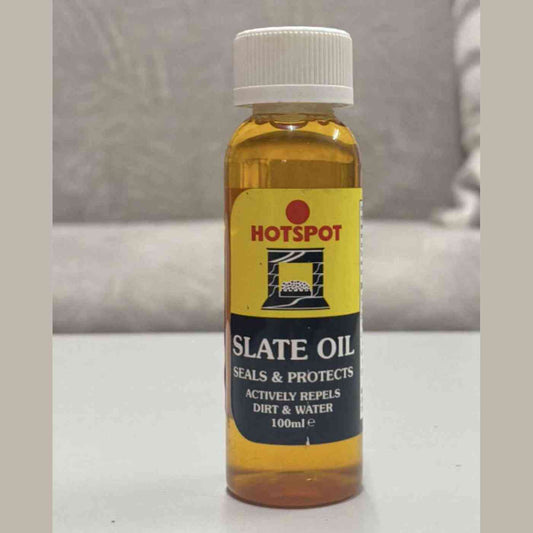 Hotspot Slate Oil 100ml front view of fireplace sealer enhancing natural stone color