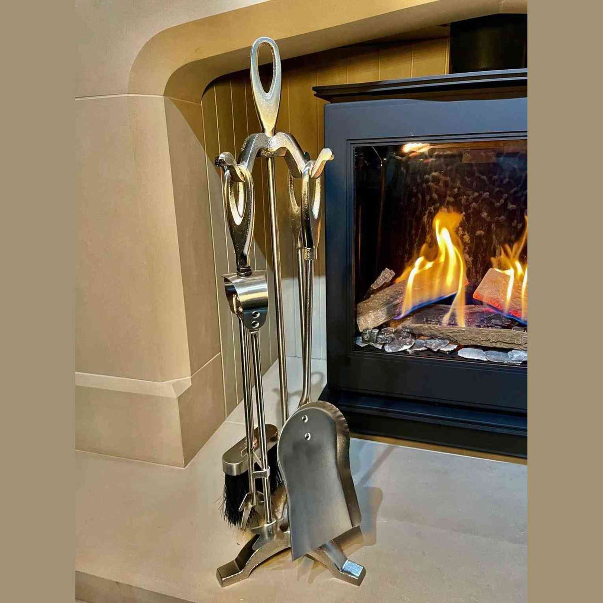 Loop Pewter 4-piece fireplace companion set with geometric loop handles on stand