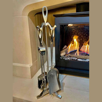 Loop Pewter 4-piece fireplace companion set with geometric loop handles on stand