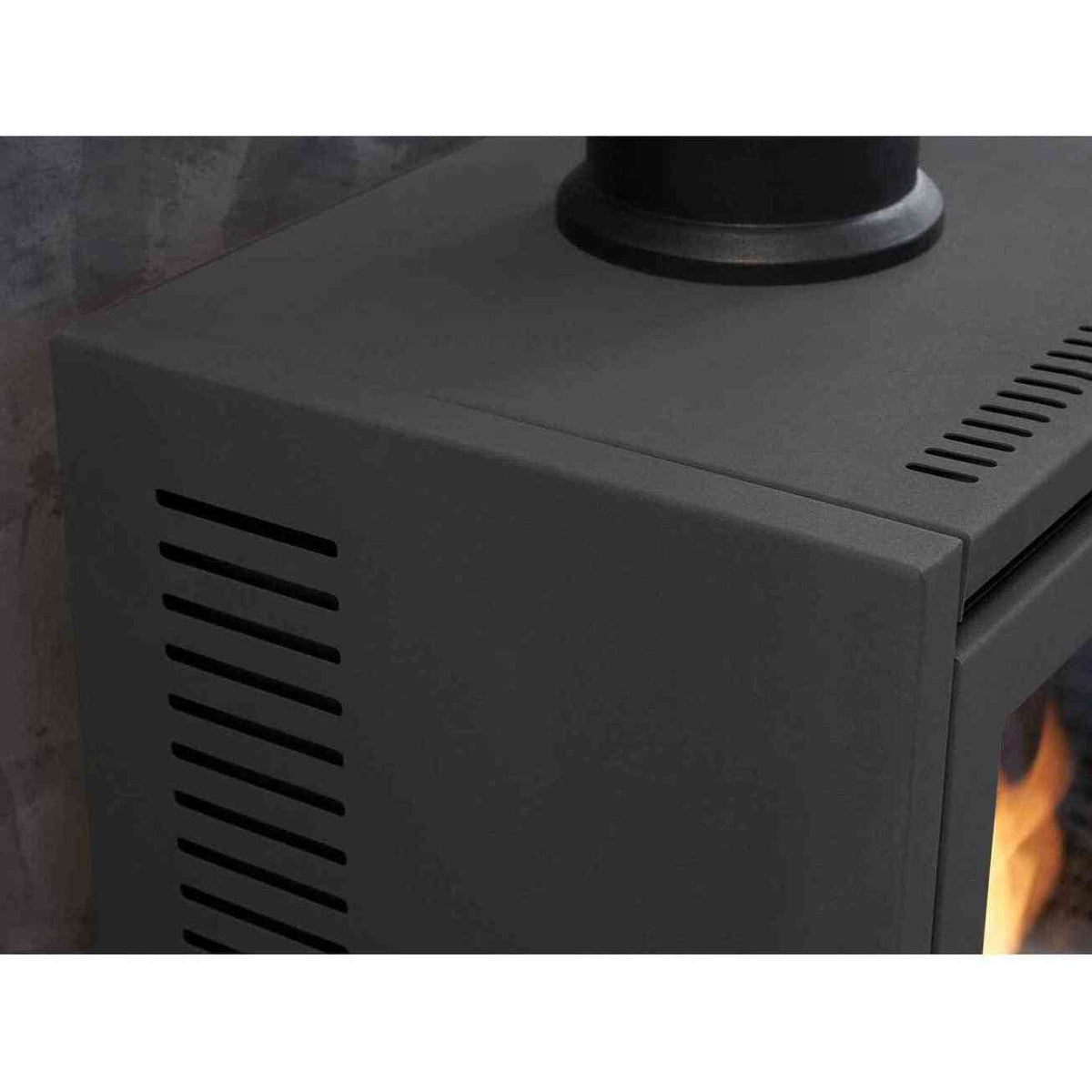 Matte charcoal grey metal body corner detail of modern bio ethanol stove
