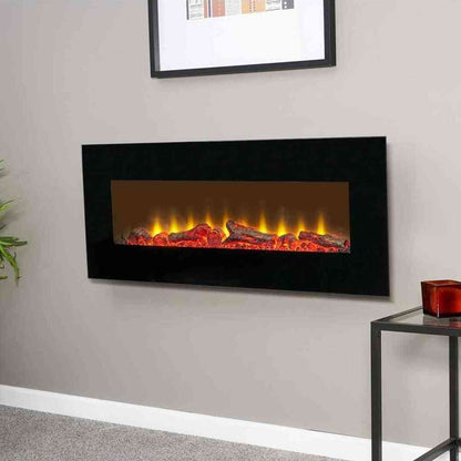 Sureflame black electric fireplace installed on gray wall with active LED flame effect
