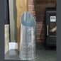 Side angle of galvanized zinc fireplace coal storage bucket