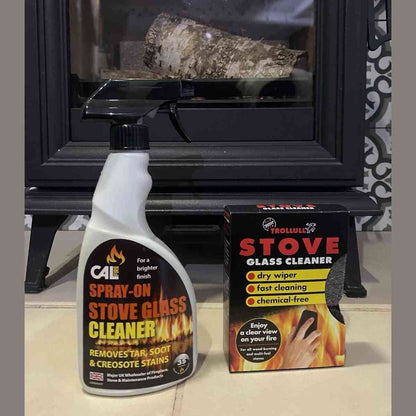 Calfire stove glass cleaner bundle with spray bottle and cleaning pads in front of wood stove