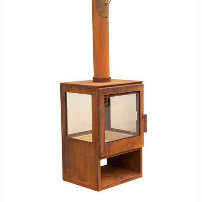 Three-quarter view of heavy-duty steel outdoor wood stove with tall chimney on white background