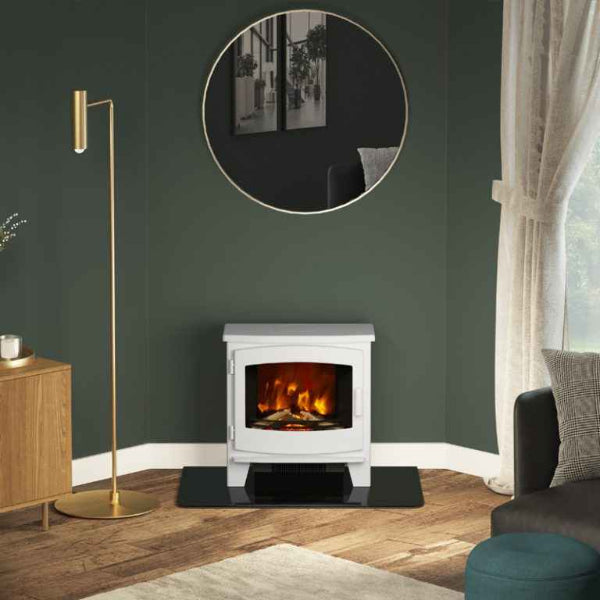 Ash White Beacon large electric stove fireplace standing on a black hearth inside a modern green living room.